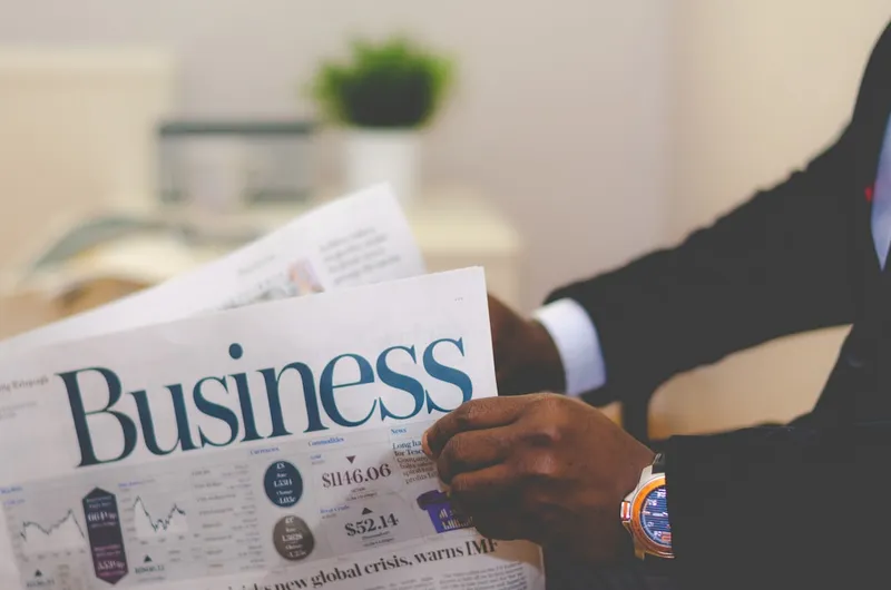 Tax Optimization - businessman reviewing financial documents